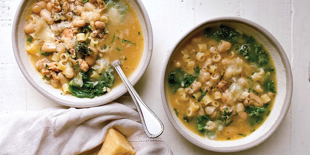 Tuscan White Bean Noodle Soup with Chicken Sausage + Kale