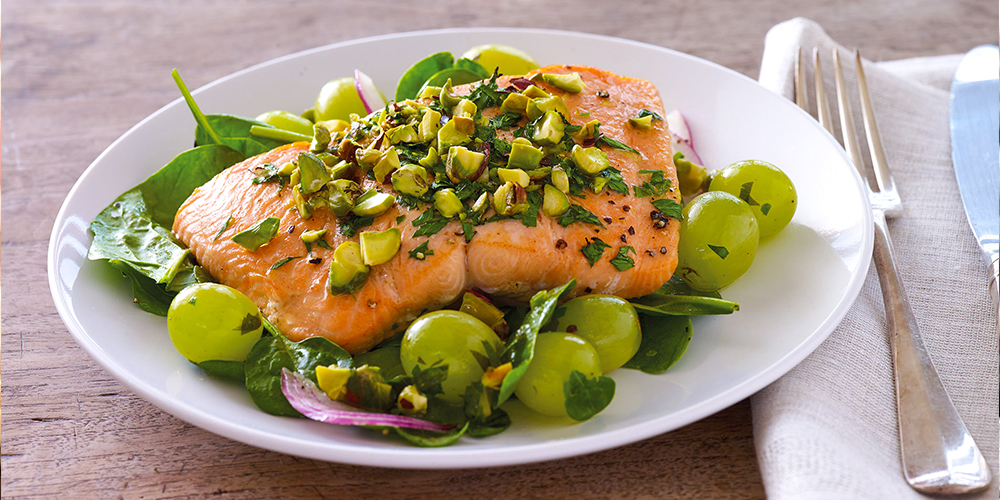 Roasted Salmon and Grapes with Pistachios Over Fresh Greens